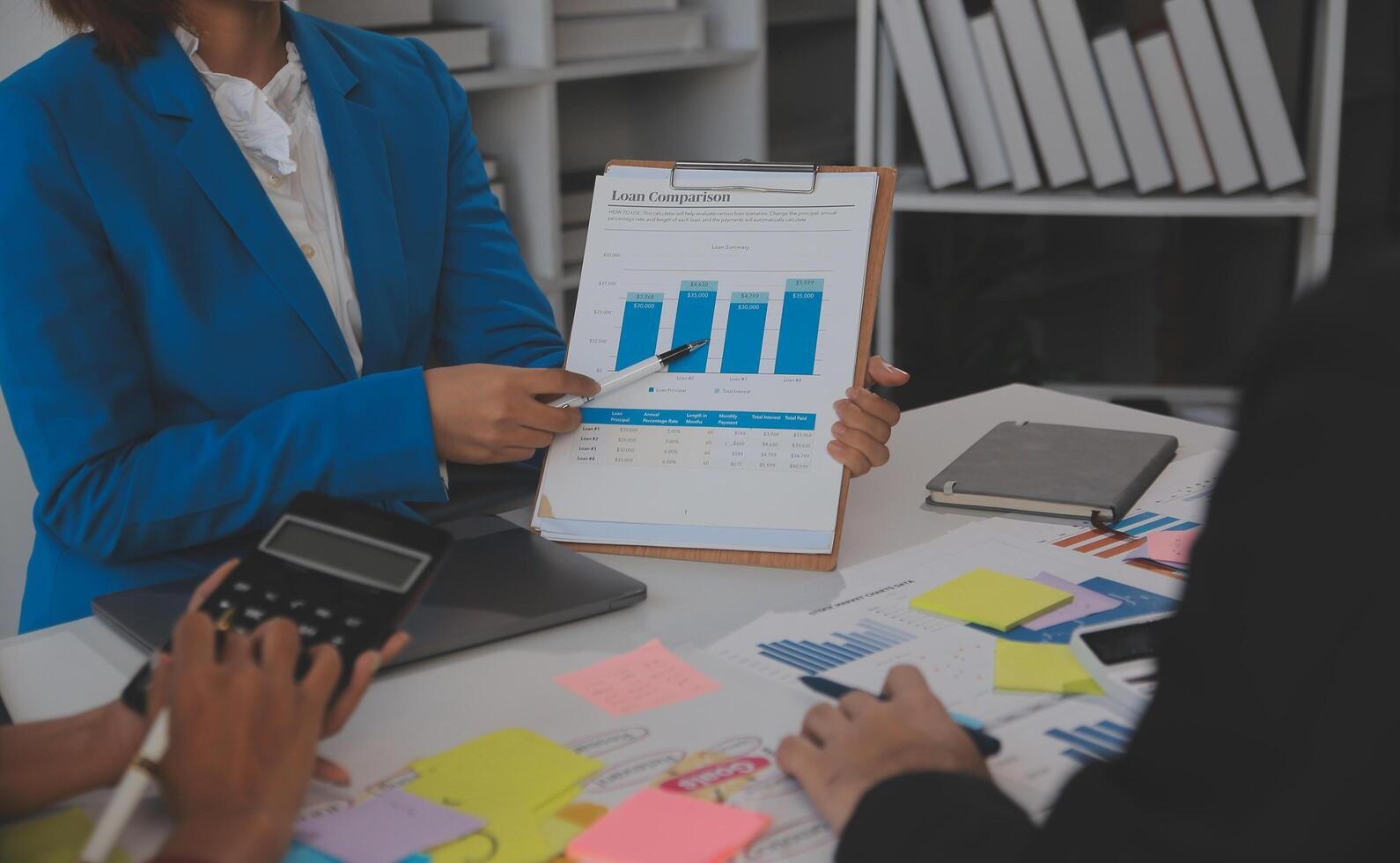 meeting-with-business-partners-to-discuss-financial-advisors-to-analyze-market-growth-charts-in-business-reports-and-plan-investment-strategies-free-photo